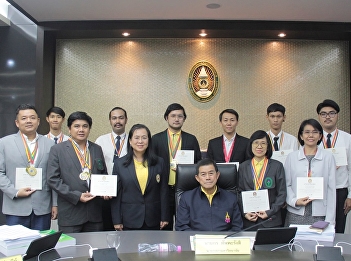 Giving honor certificates from the
President of the University Council