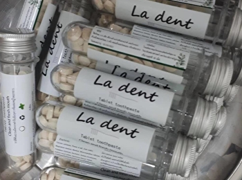 ยาสีฟันอัมฤควาทีผสมหญ้าดอกขาว ชนิดเม็ด